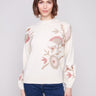 Elegant sweater with long balloon sleeves and floral print, perfect for a chic look by Charlie B.