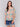 Elegant 3/4 sleeve blouse featuring a colorful pattern by Charlie B.