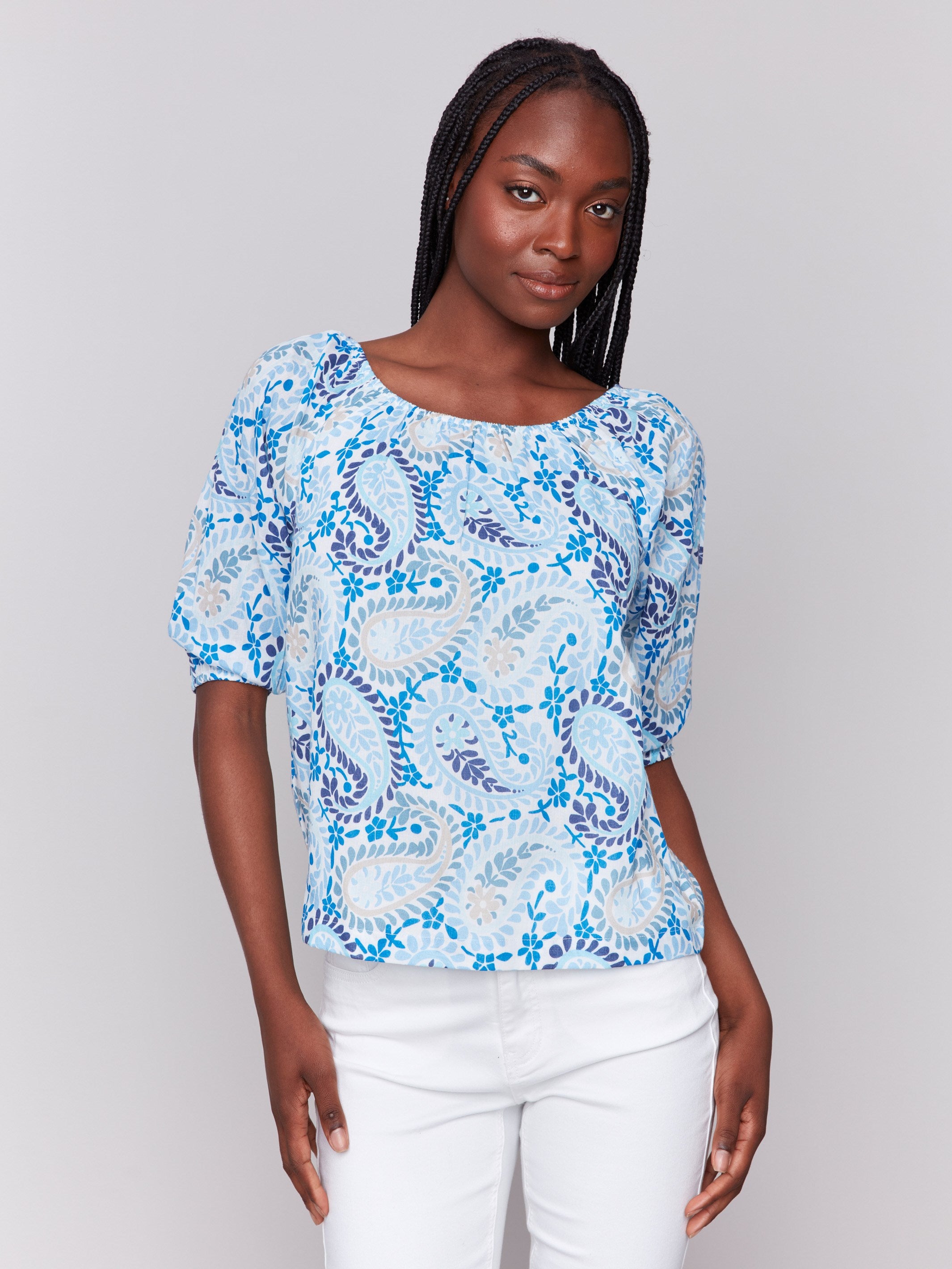 Blue paisley-patterned blouse with a round neckline, crafted from 100% cotton by Charlie B.