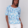 Blue paisley-patterned blouse with a round neckline, crafted from 100% cotton by Charlie B.