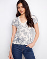 Organic cotton t-shirt with blue floral print and a stylish drop shoulder design by Charlie B.
