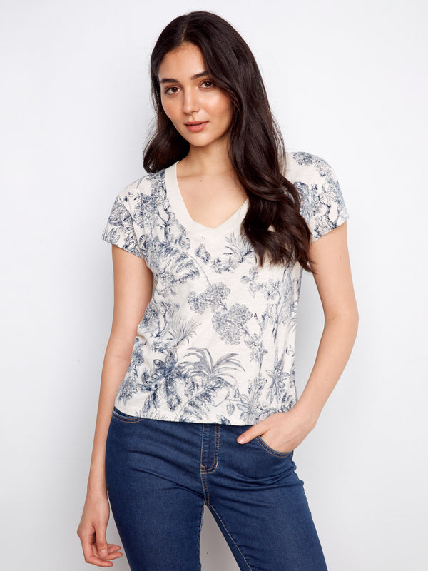 Organic cotton t-shirt with blue floral print and a stylish drop shoulder design by Charlie B.