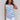 Organic cotton top with a crew neckline, featuring a blue striped pattern by Charlie B.