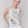 White tank top with crew neckline and feather print by Charlie B.