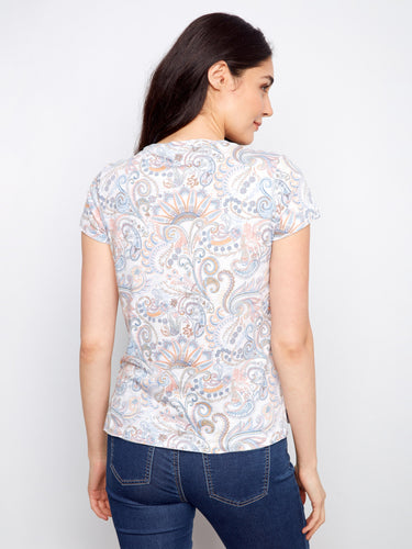 Vibrant graffiti-inspired t-shirt with a comfortable relaxed fit and short sleeves by Charlie B.