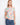 Floral print top with a crew neckline, offering a relaxed fit for easy wear. Crafted from 100% cotton for comfort. By Charlie B.