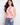 Floral tank top featuring a vibrant pink, orange, and yellow design with a crew neckline for casual elegance by Charlie B.
