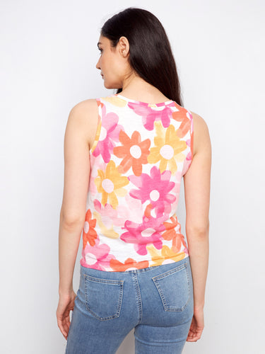 Chic sleeveless floral tank top crafted from 100% cotton showcasing bright pink, orange, and yellow flowers by Charlie B.