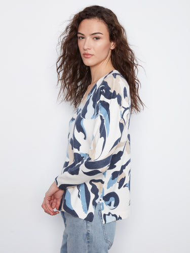 Elegant drop shoulder design adds a relaxed yet trendy touch to this stylish top by Charlie B.