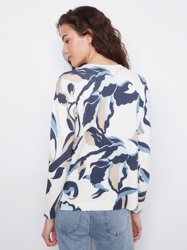 Distinctive side slits provide ease of movement and add flair to this fashionable garment by Charlie B.