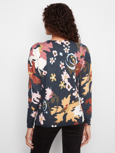 Stylish floral sweater with convenient side slits for added comfort by Charlie B.