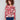 Floral sweater featuring plush texture and vibrant red and pink hues, perfect for cozy days by Charlie B.