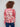 Stylish V-neck floral sweater showcasing exquisite red and pink patterns, perfect for any occasion by Charlie B.