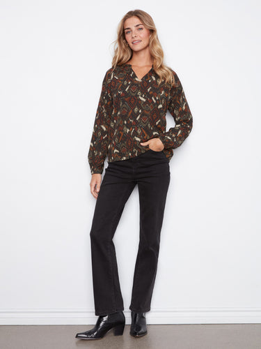 Enjoy the relaxed fit of this blouse, perfect for casual outings or dressing up with accessories. Feel at ease in style by Charlie B.