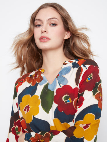 Relaxed fit floral top designed for effortless style and comfort, making it an ideal choice for casual outings. By Charlie B.