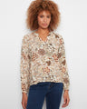 Floral patterned top featuring a stylish notch neckline, perfect for casual outings. Crafted in soft viscose fabric by Charlie B.