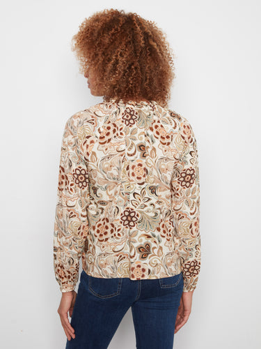 Soft viscose fabric adorns this charming floral top, ensuring all-day comfort and style. A delightful piece by Charlie B.