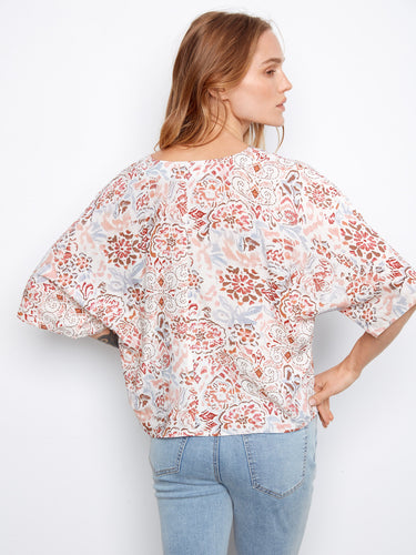 Printed popover blouse with comfortable short dolman sleeves, ideal for everyday wear by Charlie B.
