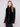 Soft faux fur design with a sleek zipper front, perfect for chic winter fashion by Charlie B.