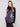 Floral print quilted vest with welt pockets for convenient storage on the go by Charlie B.