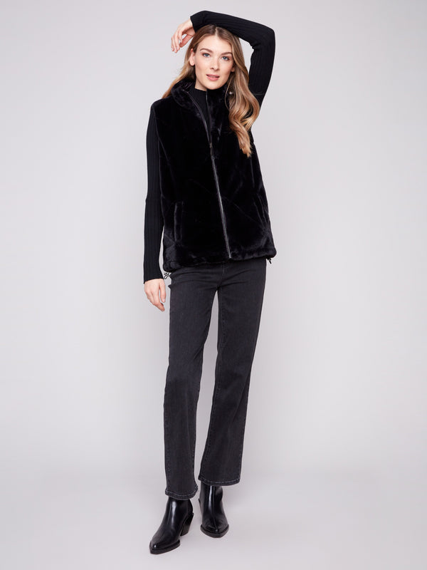 Zipper front closure on a stylish floral quilted design, ensuring ease and flair in every wear by Charlie B.