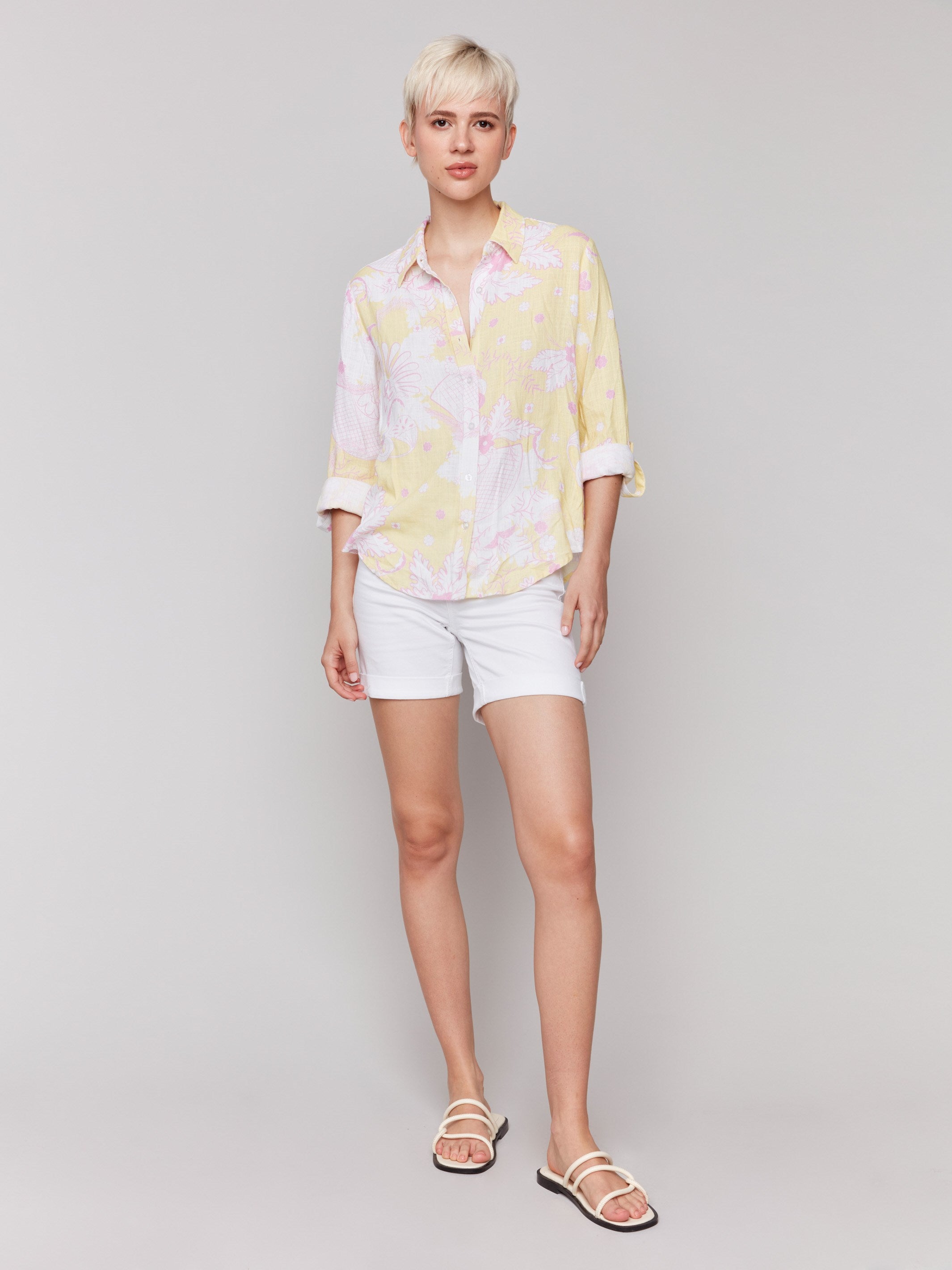 Printed yellow shirt featuring a button-down front by Charlie B.