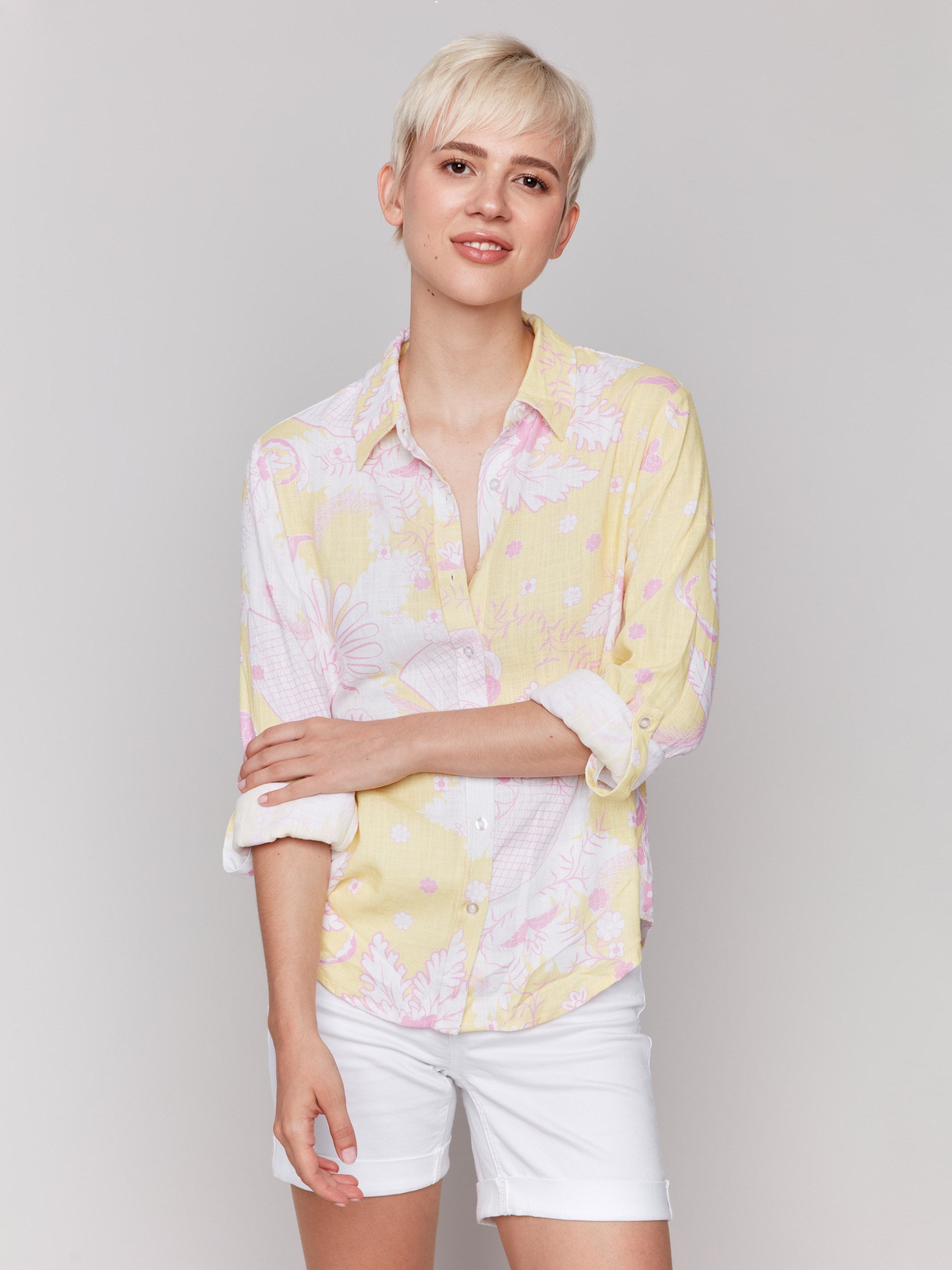 Elegant yellow shirt showcasing wide cuffs by Charlie B.