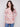 Sweater featuring an abstract floral design with a boat neck, offering a stylish and comfortable look by Charlie B.