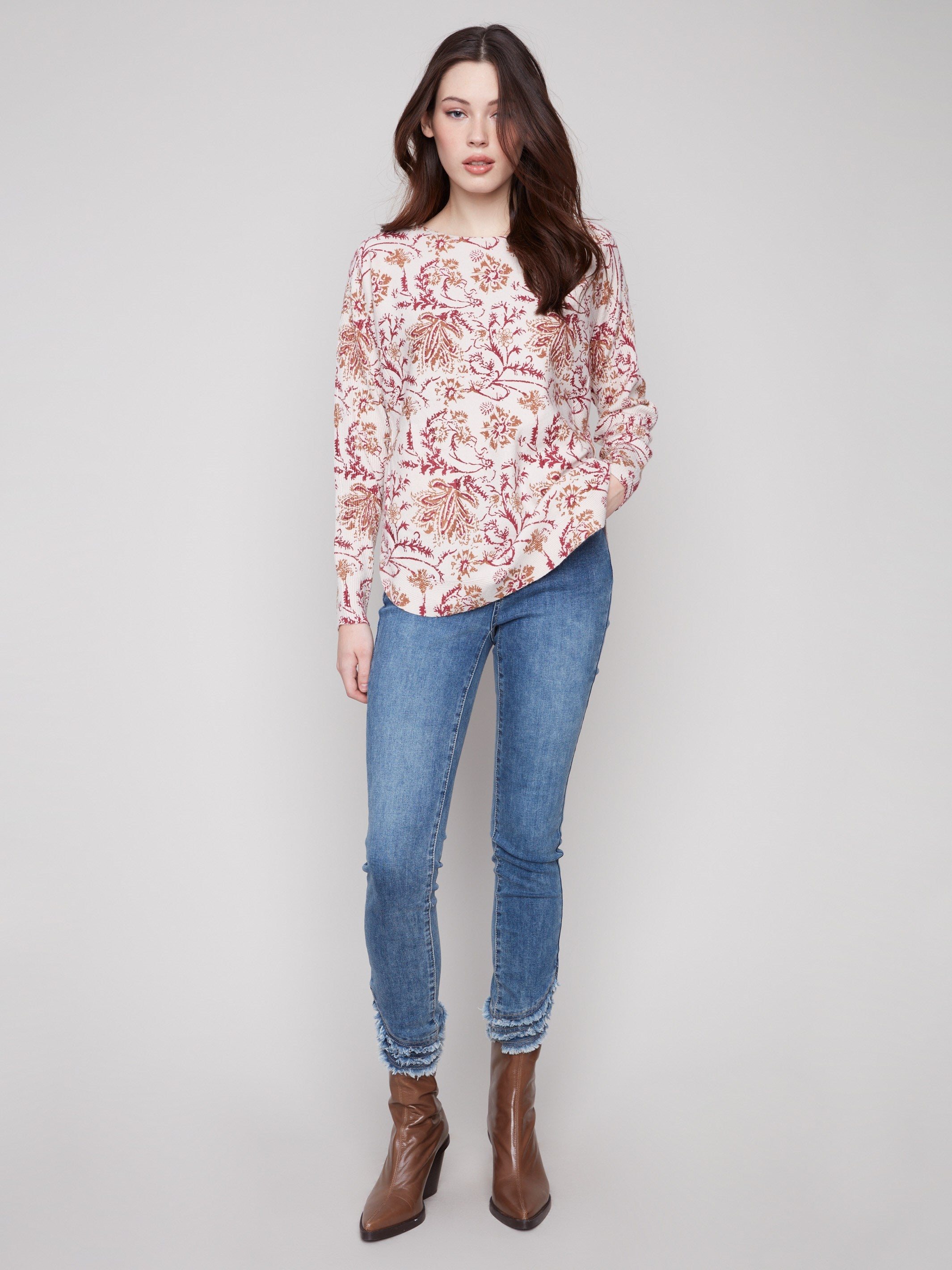 Elegant sweater with ribbed sleeves and a charming floral pattern, perfect for casual outings by Charlie B.