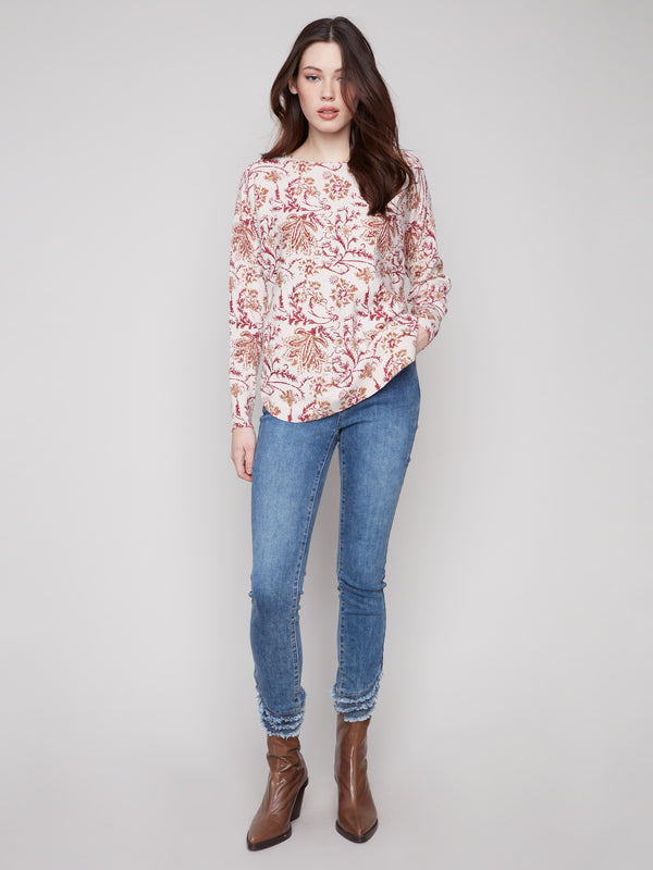 Elegant sweater with ribbed sleeves and a charming floral pattern, perfect for casual outings by Charlie B.