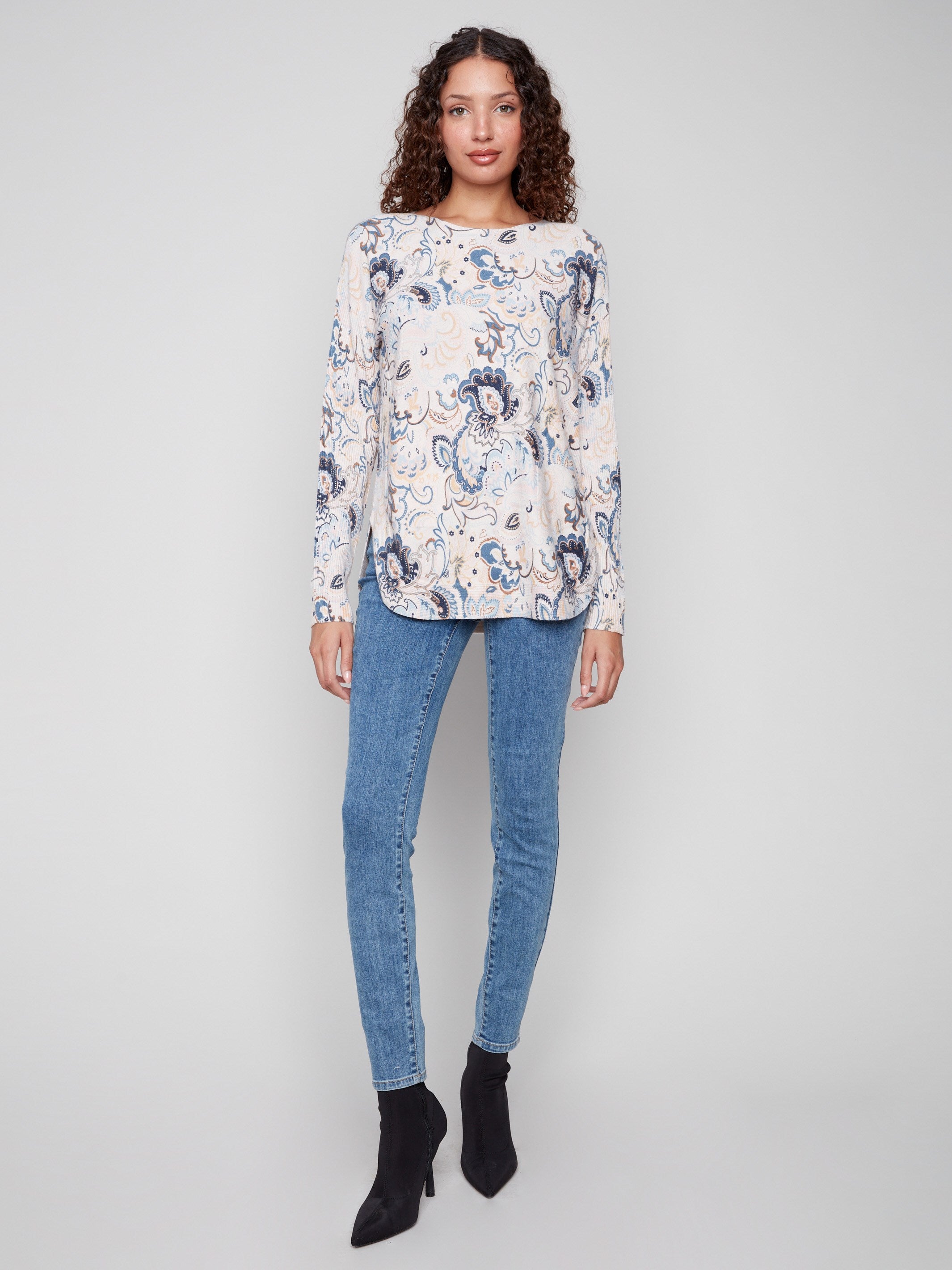 Floral print sweater with a rounded hem and stylish side slits, perfect for layering by Charlie B.