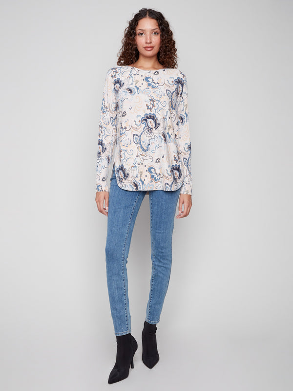 Floral print sweater with a rounded hem and stylish side slits, perfect for layering by Charlie B.