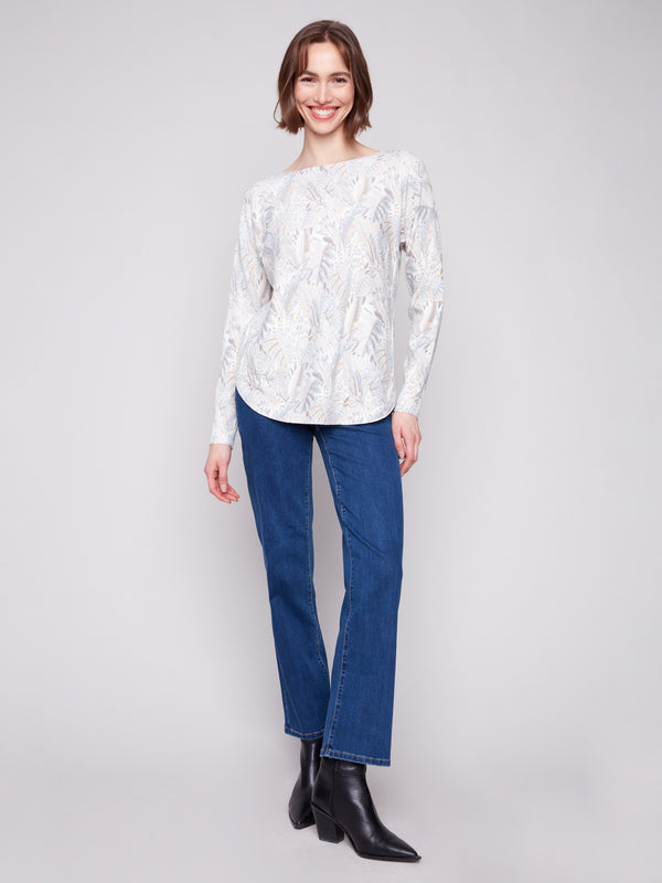 Relaxed fit sweater showcasing a unique foliage pattern by Charlie B.