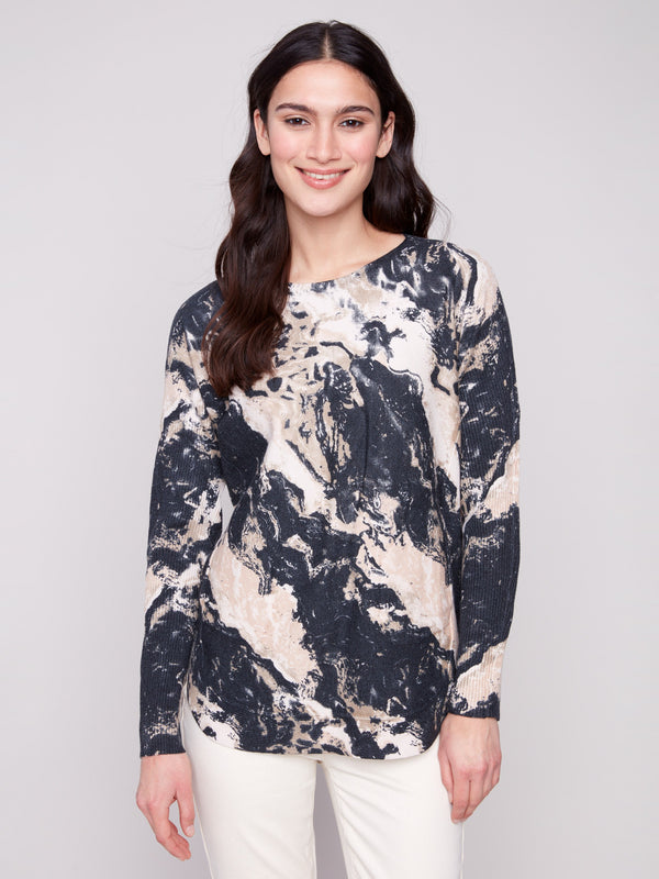 Granite sweater showcasing a stylish boat neck and abstract marbled design, perfect for casual outings by Charlie B.