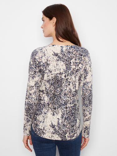 Versatile top complete with side pockets, blending practicality with fashion effortlessly by Charlie B.