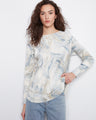 Sweater with abstract pattern, long sleeves, and drop shoulders. Features a boat neckline for added style by Charlie B.
