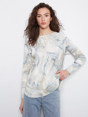 Sweater with abstract pattern, long sleeves, and drop shoulders. Features a boat neckline for added style by Charlie B.