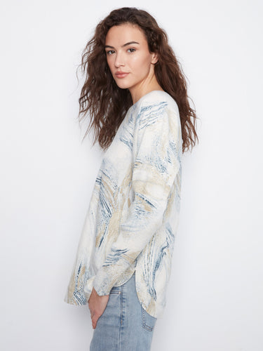 Chic sweater showcasing an abstract design, complete with side pockets and a comfortable fit by Charlie B.