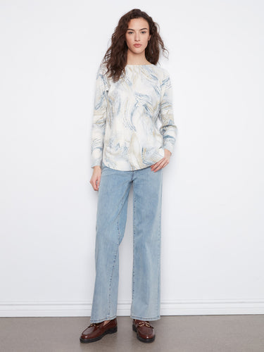 Abstract patterned sweater offering both style and functionality with its side pockets by Charlie B.
