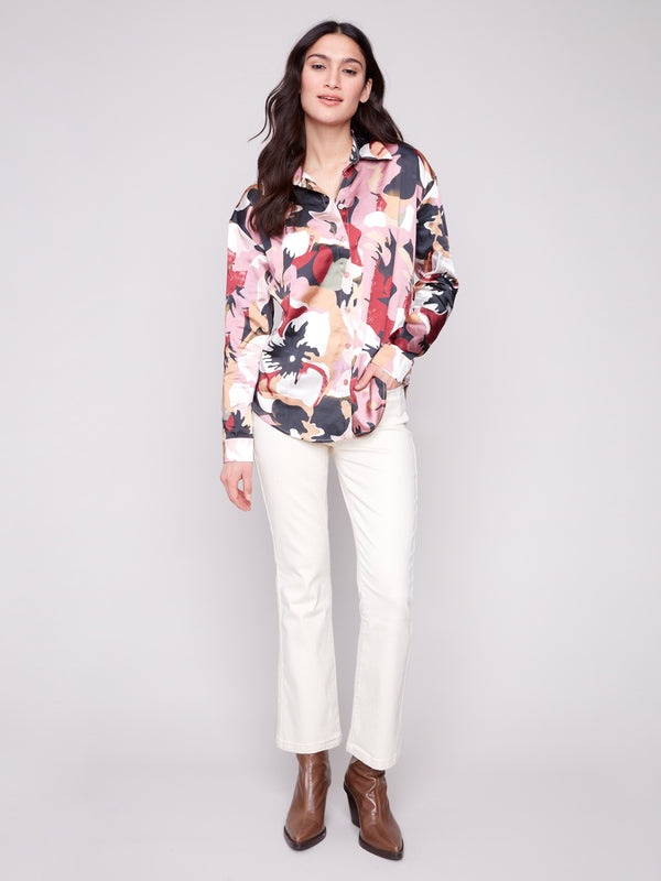 Elegant button-down satin shirt with a bold pattern and long cuffed sleeves by Charlie B.
