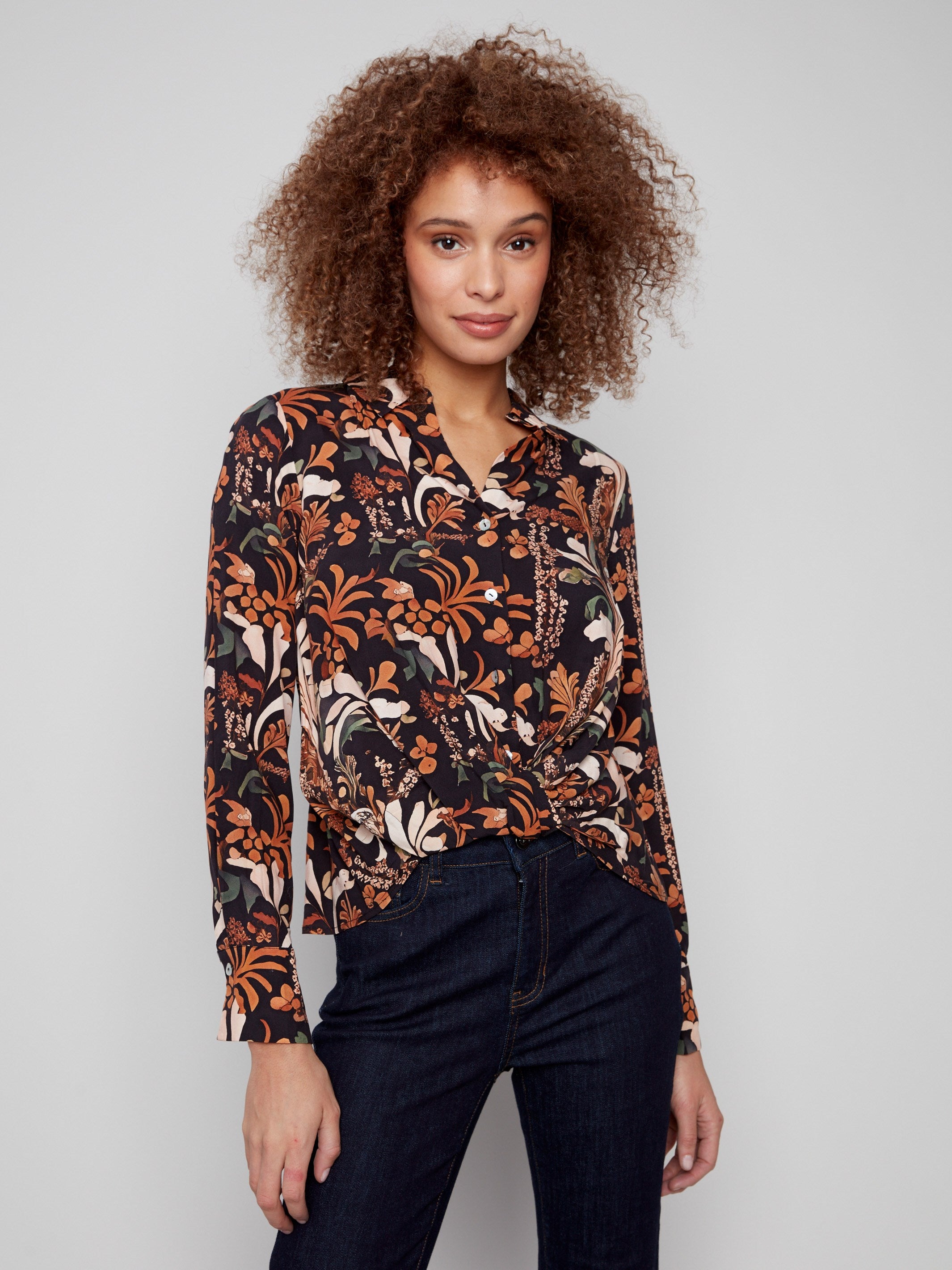 Floral batik shirt featuring a classic shirt collar and button-down closure, adding elegance to any outfit by Charlie B.