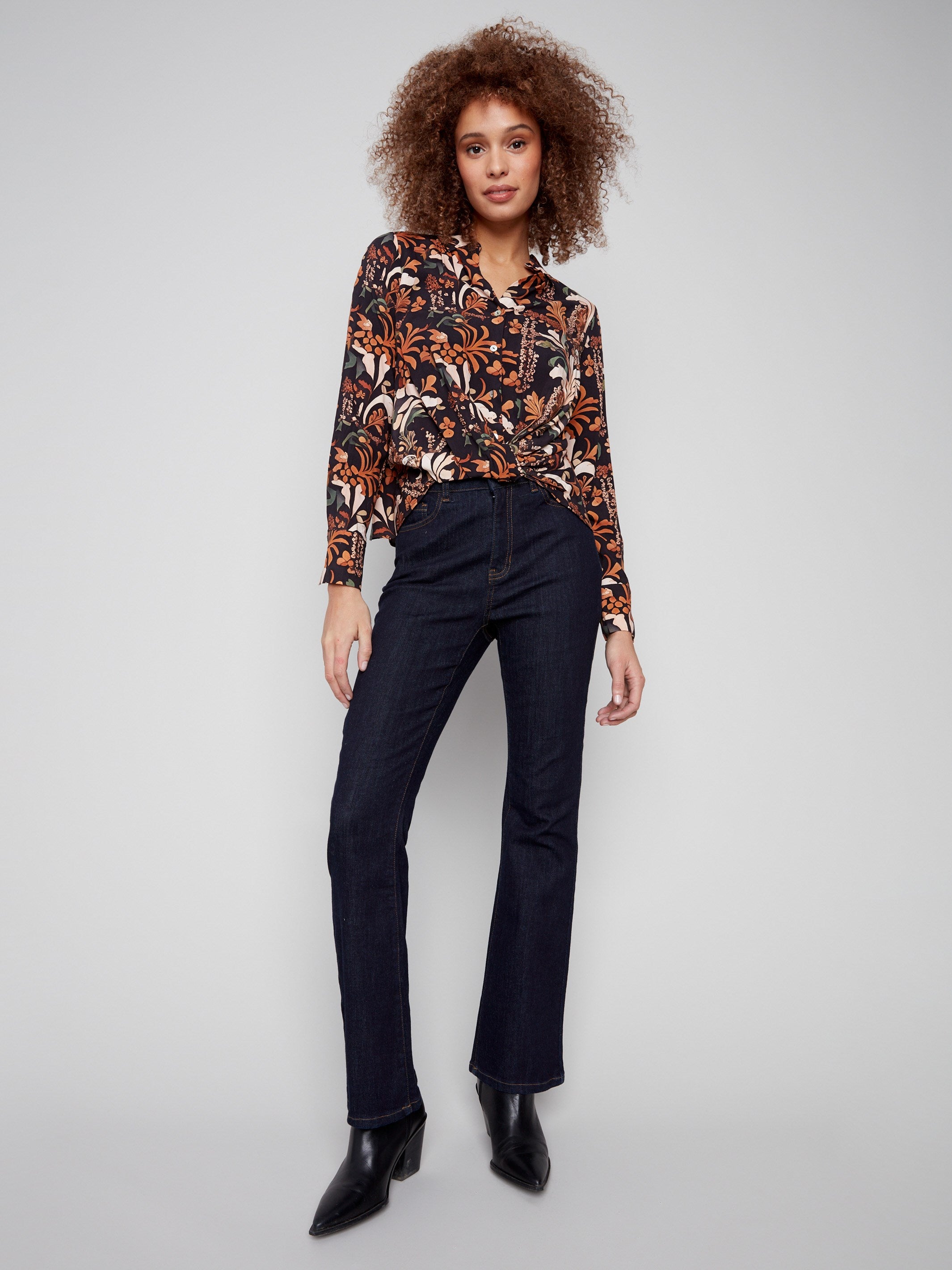 Chic long-sleeve shirt with a floral batik design and twisted front detail for a unique style statement by Charlie B.