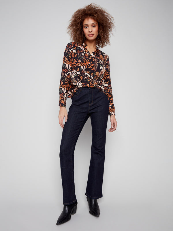 Chic long-sleeve shirt with a floral batik design and twisted front detail for a unique style statement by Charlie B.