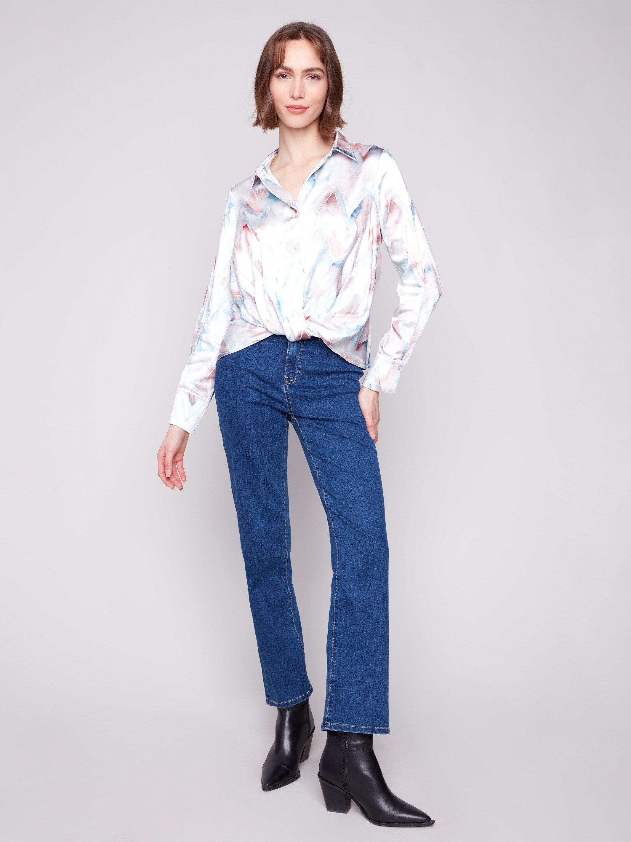 Elegant button-down shirt with a stylish twisted front, crafted from luxurious satin fabric by Charlie B.