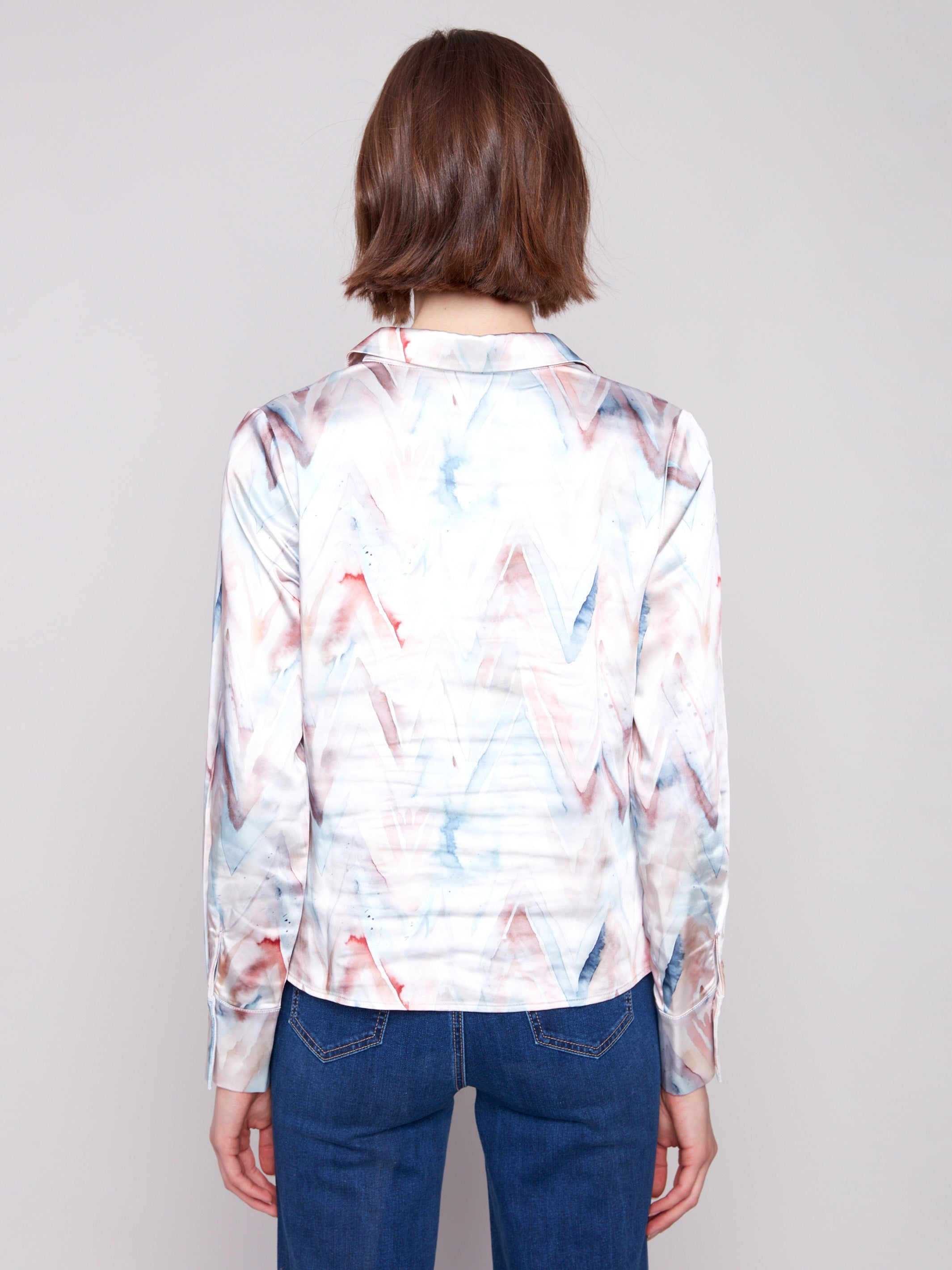 Stylish chevron print shirt in soft sheen satin, adorned with long sleeves for an elegant look by Charlie B.