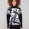 Black and cream abstract patterned top with front seam detail, featuring long sleeves by Charlie B.