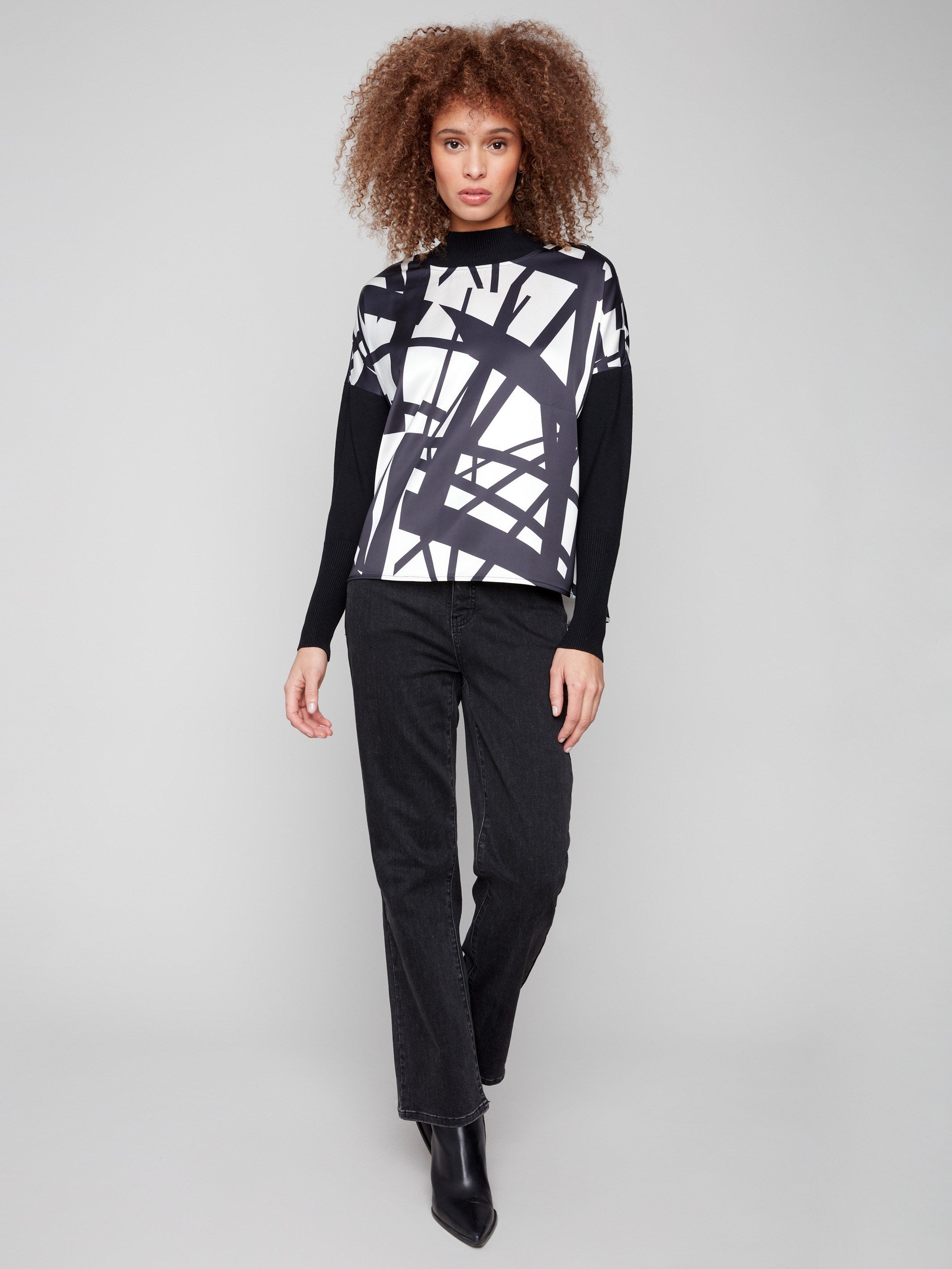 Abstract patterned mock neck top with ribbed sleeves and neckline in black and cream by Charlie B.