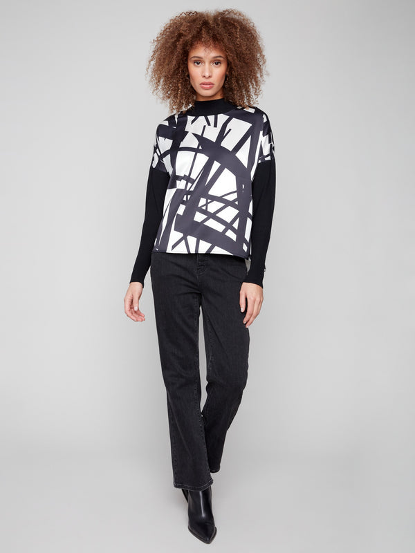 Abstract patterned mock neck top with ribbed sleeves and neckline in black and cream by Charlie B.