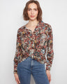 Floral shirt with a classic collar, showcasing long sleeves and a unique design by Charlie B.