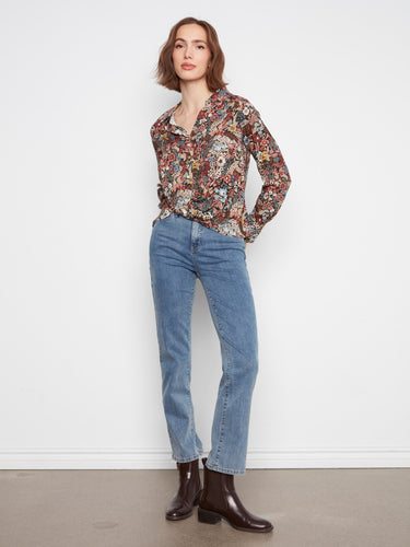 Chic button-front floral top featuring a twisted front detail for added style by Charlie B.